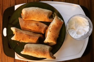 Taquitos with sour cream