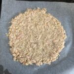 Chicken Crust spread on Parchment Paper